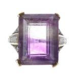 18ct amethyst ring with a stylised diamond mount, 15.00ct approx, 19mm x 15mm, 10.7gm, ring size K