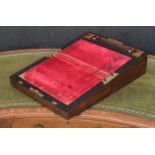 Victorian rosewood writing slope, the hinged top with mother of pearl plaque and escutcheon,