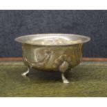 Edward VII silver bowl, repousse decorated with swags with a reeded rim, raised on three shell