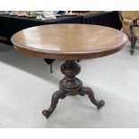 Victorian mahogany circular tilt-top breakfast table, the moulded tilting top over a baluster turned