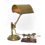 Vintage brass bankers lamp, height adjustable on a circular weighted desk stand, 16.5" high max;