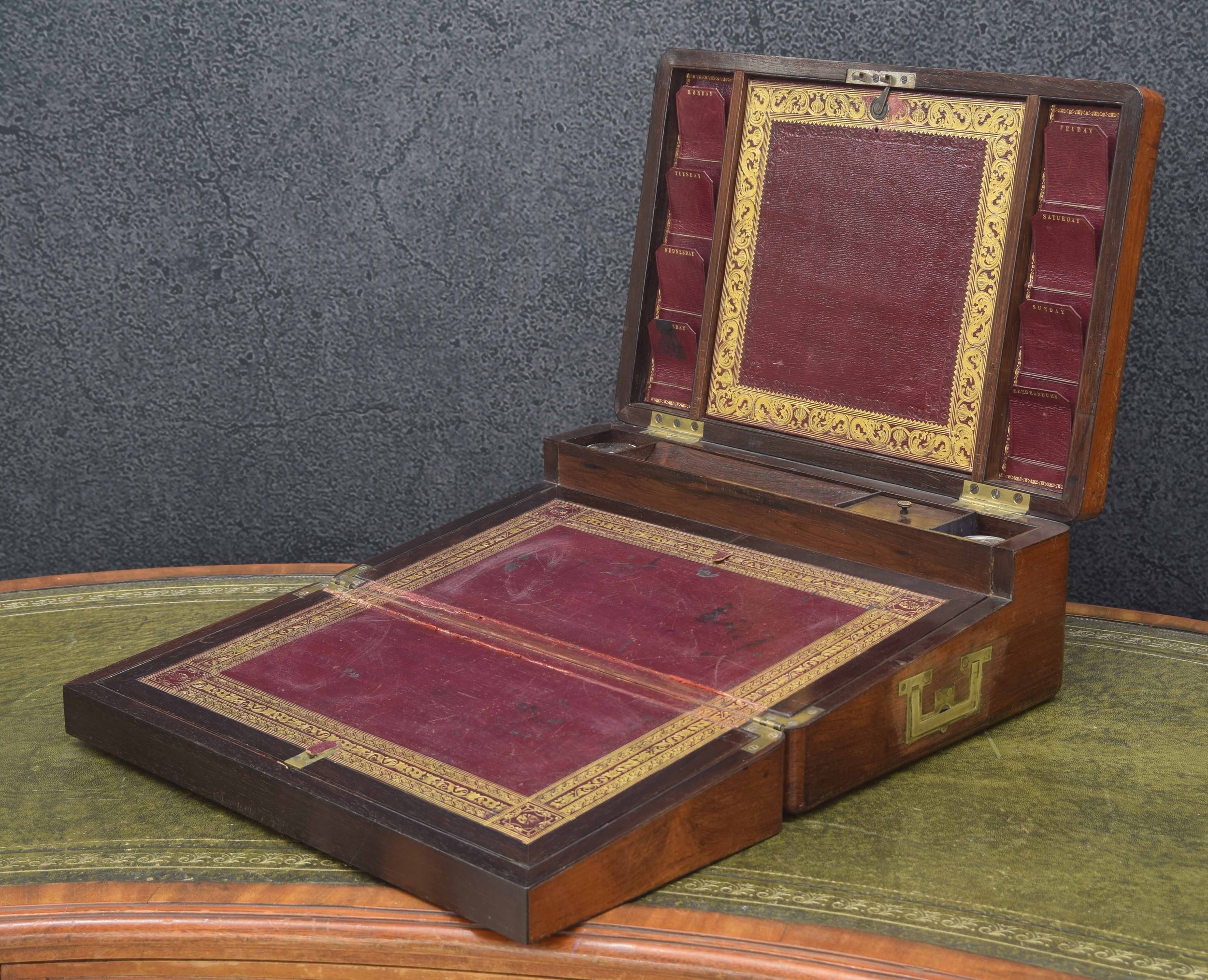 19th century rosewood and brass inlaid writing slope, the hinged cover with foliate brass inlaid