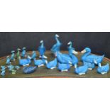 Collection of turquoise blue glazed porcelain duck figures, tallest 10" high; also some green