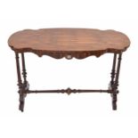 Victorian yew wood serpentine stretcher table, raised on turned supports united by a turned