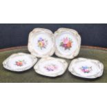 Five early 19th century Chamberlain Worcester porcelain plates, painted with differing floral sprays