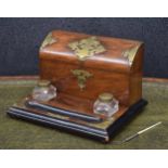 Victorian walnut stationary/desk box, the hinged cover with applied brass mounts enclosing a divided