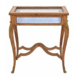 French kingwood bijouterie display table, the glazed hinged cover enclosing a cushioned interior