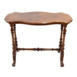 Victorian figured walnut serpentine stretcher table, the inlaid top upon turned supports united by a