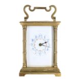 French carriage clock striking on a gong, the dial with Arabic numerals enclosing painted
