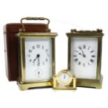 Carriage clock striking on a gong, within a cornice brass case, 5.75" high (key); also another