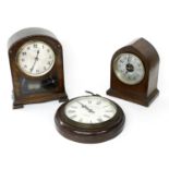 Bulle-Clock electric mantel clock within a rounded arched oak case, 12" high; also another Bulle