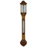 Good oak stick barometer/thermometer, the angled scale within a glazed window over a flat trunk