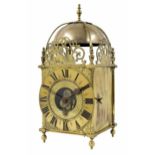 Eureka Cromwellian brass electric lantern clock, the 7" brass dial enclosing a foliate engraved