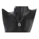 Art Deco style 18ct white gold aquamarine and diamond pendant on a slender 18ct necklace, the