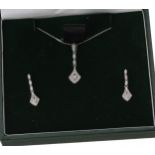 Modern 9ct white gold diamond pendant and earring set, 3gm, the pendant 24mm, the earrings with post