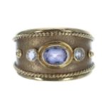 18ct yellow gold sapphire and diamond dress ring, the sapphire 0.70ct approx, with two round