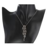 Attractive 18ct white gold pavé diamond drop articulated pendant on a fine bead necklace, round