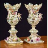Pair of 19th century Coalbrookdale porcelain pedestal vases, with applied floral decoration modelled