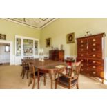 Fine quality 19th century mahogany inlaid D end extending dining table, with a centre dropleaf