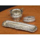Edwardian silver sucrier, repousse decorated with C scrolls and flowers, maker William Henry