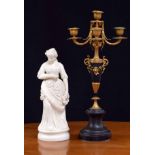Parian porcelain figure of a lady holding a wreath of flowers, 13" high; together with a French