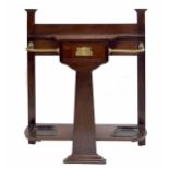 Arts & Crafts mahogany hall stand stamped Maple & Co., with brass rails aside a central slim