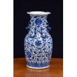 19th century Chinese blue and white porcelain baluster vase, with a flared rim over Dog of Fo