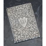 Victorian silver card case, with foliate scrolling engraved decoration around a shield monogrammed