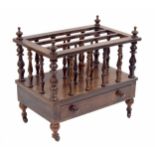 Victorian rosewood Canterbury, with three divisions on turned spindle supports, over a single drawer