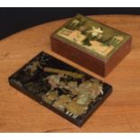 Japanese lacquered papier mache box, the hinged cover with the transfer gilded image of a lumberjack