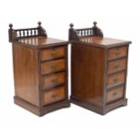 Pair of late Victorian walnut and ebony bedside chest of drawers, with raised gallery backs over
