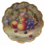Royal Worcester porcelain plate, painted with a still life of fruit by T Lockyer, signed, with a