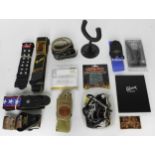 Selection of assorted guitar accessories to include a selection of straps, various capos, a Graph