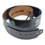 Michael Chapman - a distinctive broad leather guitar strap, inlaid with turquoise medallions *