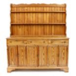 Tony Zemaitis - a large pitch pine dresser, with three tier panelled delft rack over three short