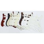 Twelve Fender and Squier Stratocaster scratchplates