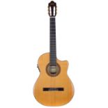 Camps NAC-4 electro-classical guitar, made in Spain; Back and sides: rosewood; Top: natural