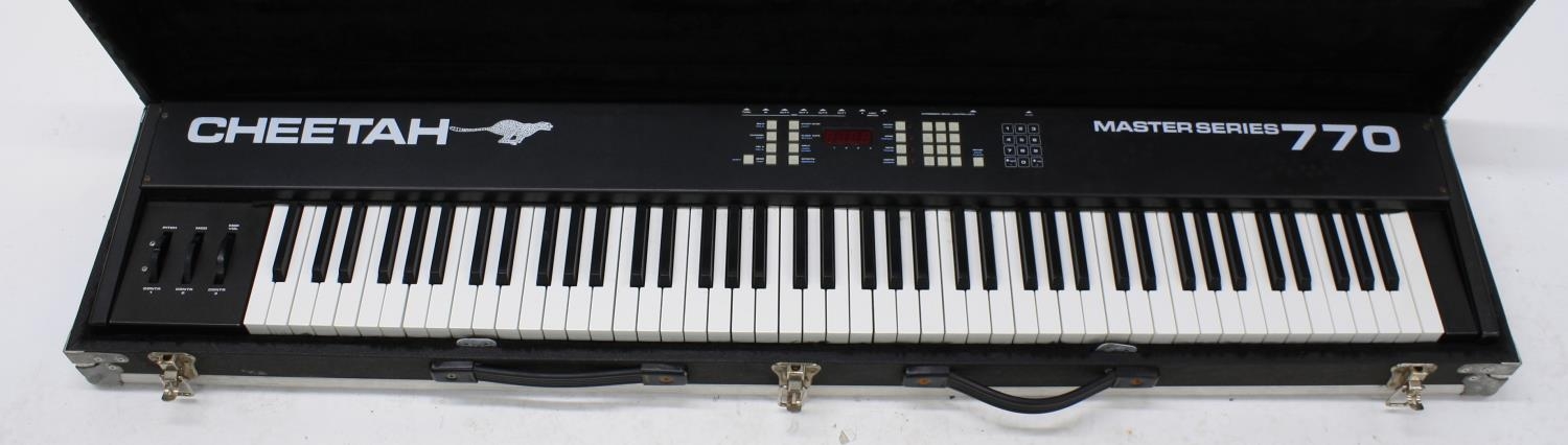 Cheetah Master Series 770 midi controller keyboard with weighted keys, within a fitted heavy duty