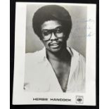 Herbie Hancock - an autographed CBS promotional black and white photograph with tribute - 'To