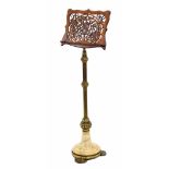 Victorian adjustable music stand, the rosewood ledge pierced with scrolling foliage and supported