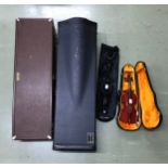 Getzen trombone case and Holton trombone case; also a Suzuki child's voilin outfit, bow and case and