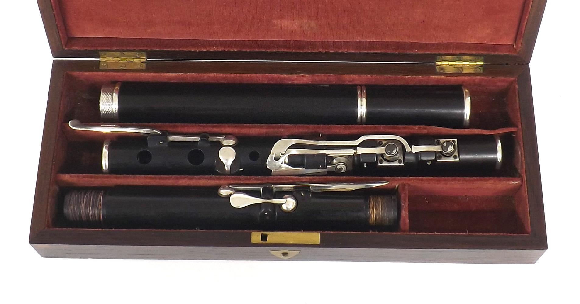 Good cocuswood flute by and stamped Rudall & Rose, London, with patent head joint and eight silver - Image 3 of 3