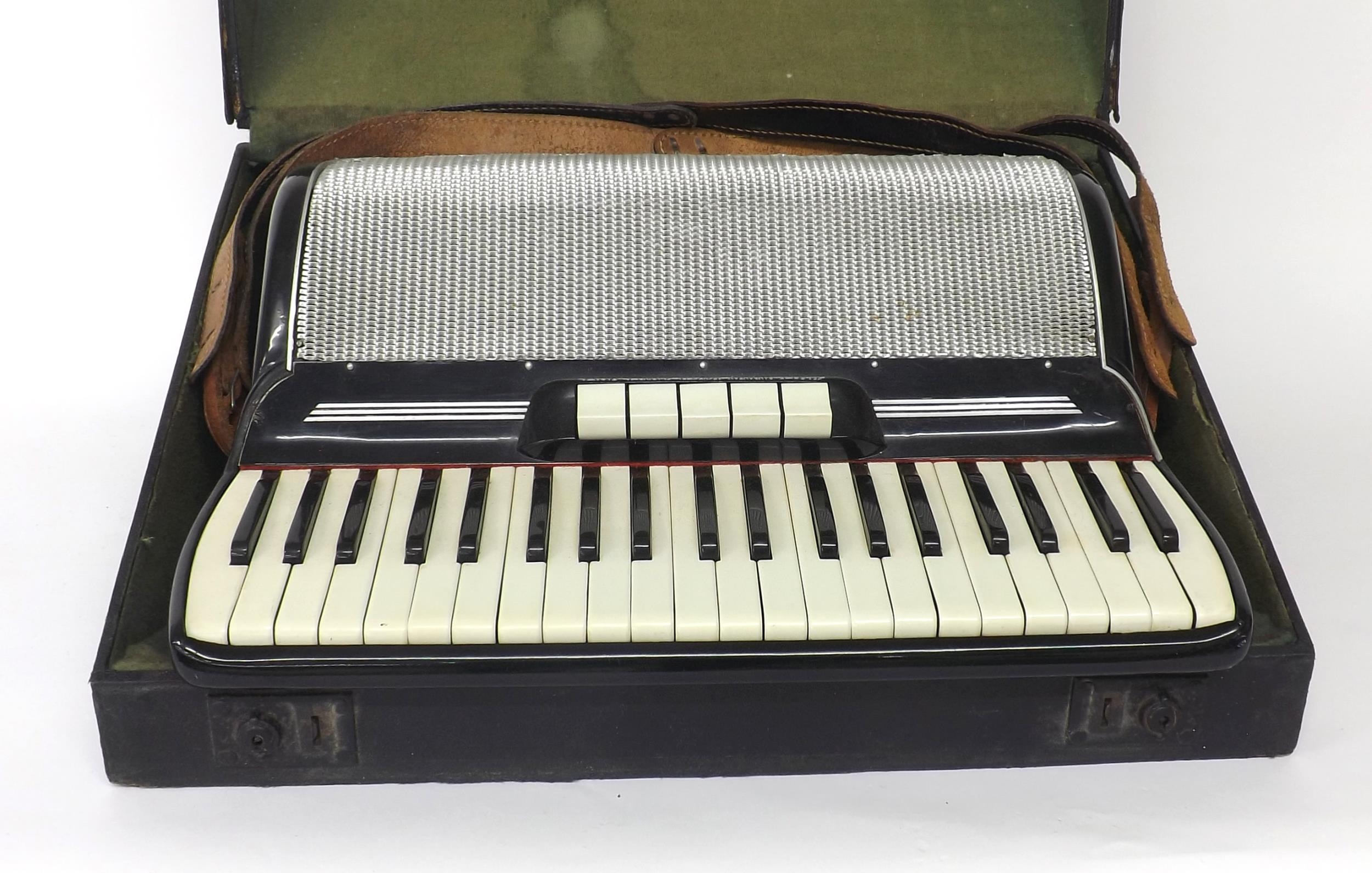 Gaudini piano accordion with one hundred and twenty buttons and five switches, black finish, case - Image 3 of 3