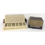 Hohner Verdi II eighty button piano accordion, case; also an old German melodeon (2)