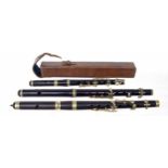 English blackwood six key piccolo by and stamped Geo Potter & Co, Aldershot, leather case; also a
