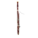 Corton bassoon with three crooks, fitted case