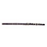 Good rosewood flute, unstamped, with eight nickel plated salt spoon keys on wooden blocks,
