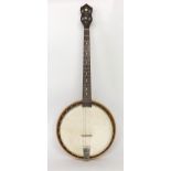 Old tenor banjo with attractive alternating segmented resonator back, 11" skin, mother of pearl