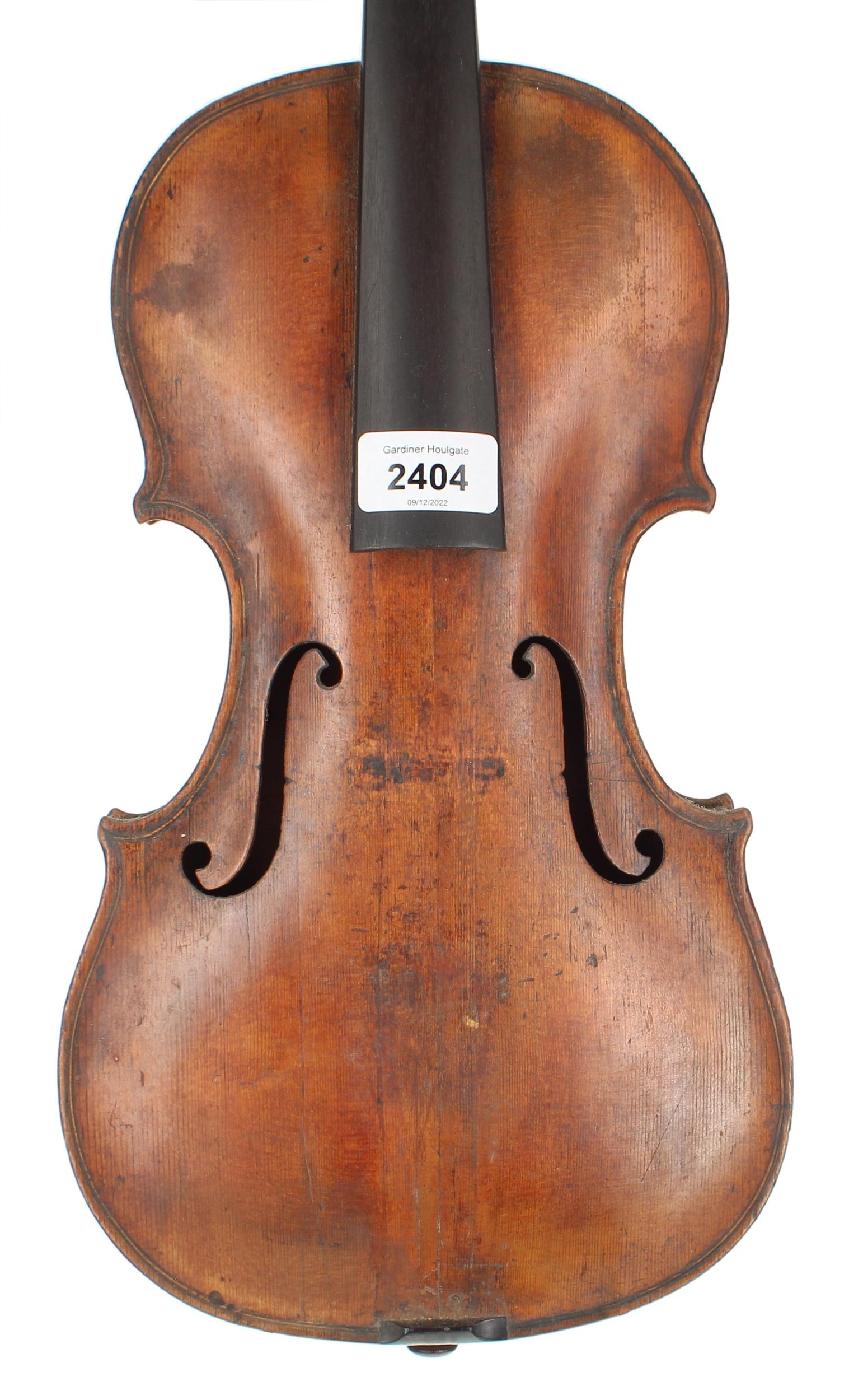 Interesting late 18th/early 19th century violin, unlabelled, the two piece back of very faint medium