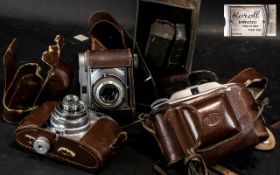 Collection of Three Vintage Cameras, com